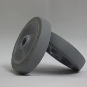 A grey Colson Hi-Tech Performa wheel measuring 4 inches by 7/8 inches (101.6 x 22.2 mm).