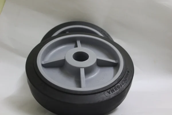 A black Colson Hi-Tech Performa wheel measuring 8 inches by 2 inches (203.2 x 50.8 mm).